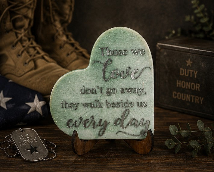 Sage green resin heart plaque with military memorial poem on wooden stand, front view